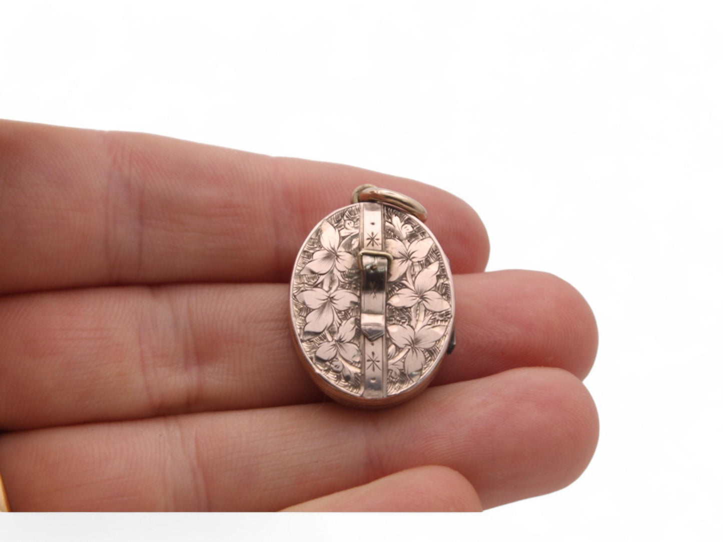 RESERVED —— Antique 9ct Gold Chased Floral Buckle Locket