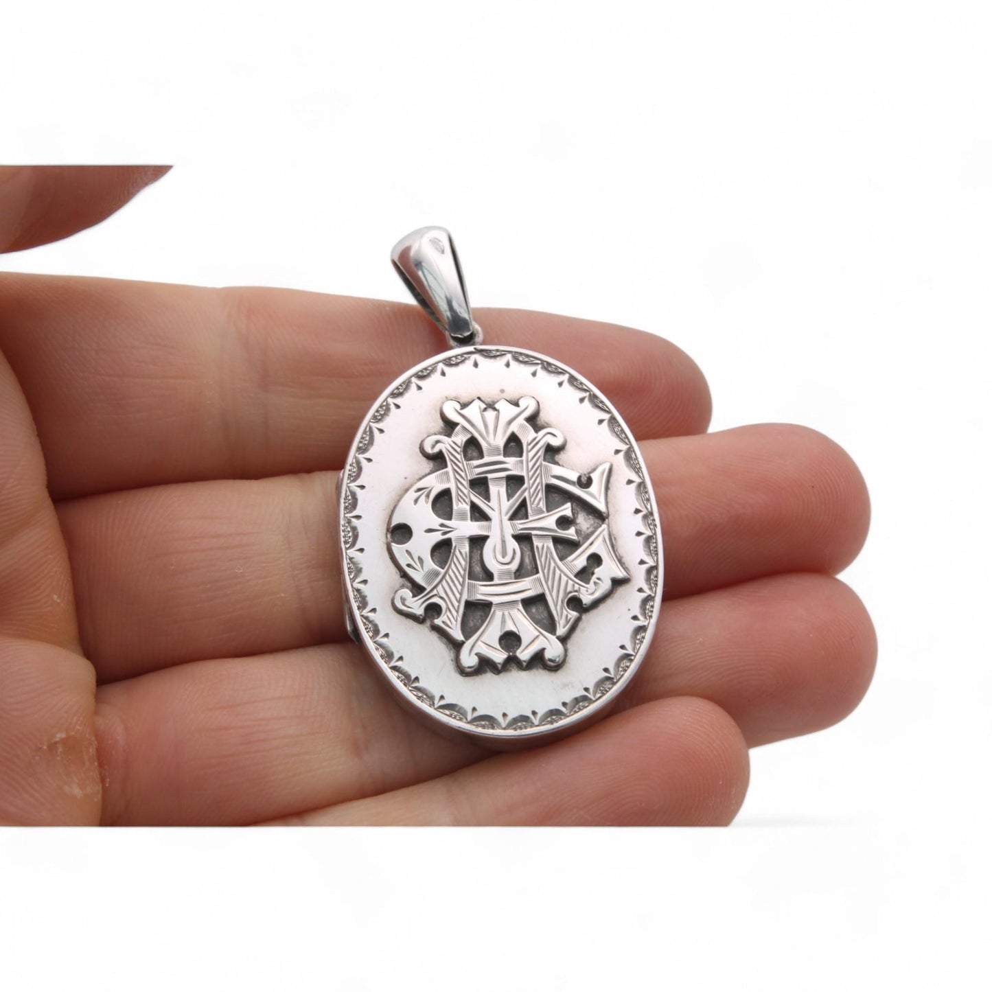 Antique Sterling Silver Amity, Eternity, Infinity Locket