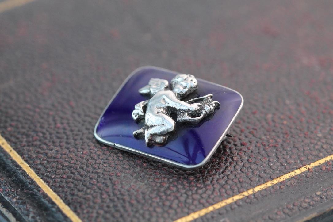 Antique Sterling Silver Blue Enamel Cupid Brooch