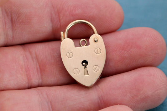 Vintage 9ct yellow gold heart padlock clasp shown closed from the front