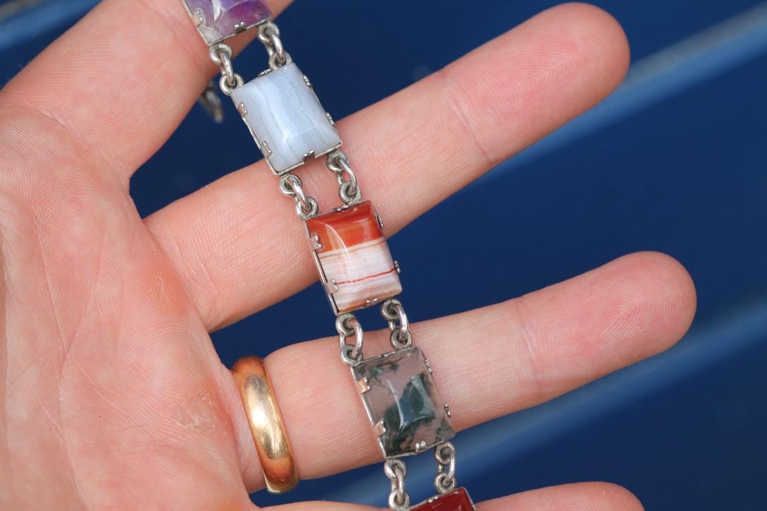 Vintage gemstone bracelet showing banded agate and moss agate panels