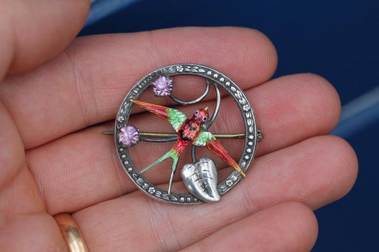 Art Deco sterling silver brooch with colourful enamel swallow and purple stones