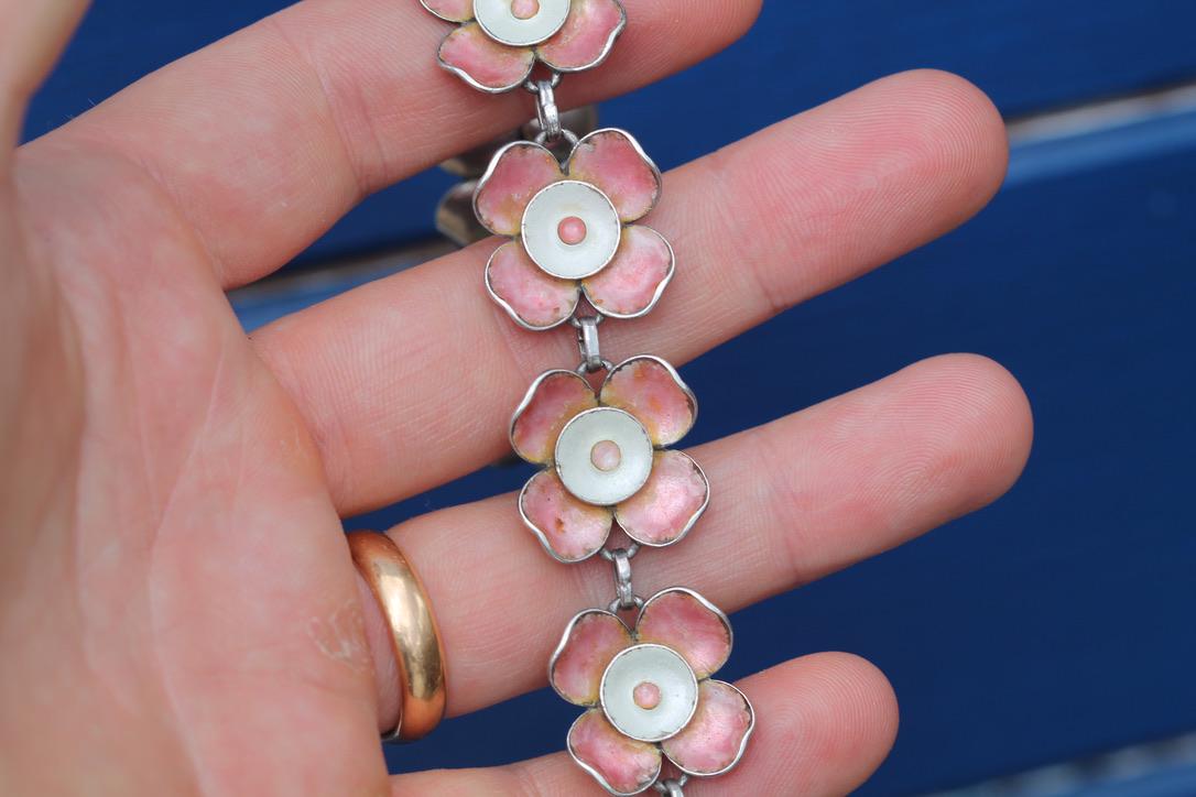 Vintage sterling silver bracelet with linked pink and white enamel flowers