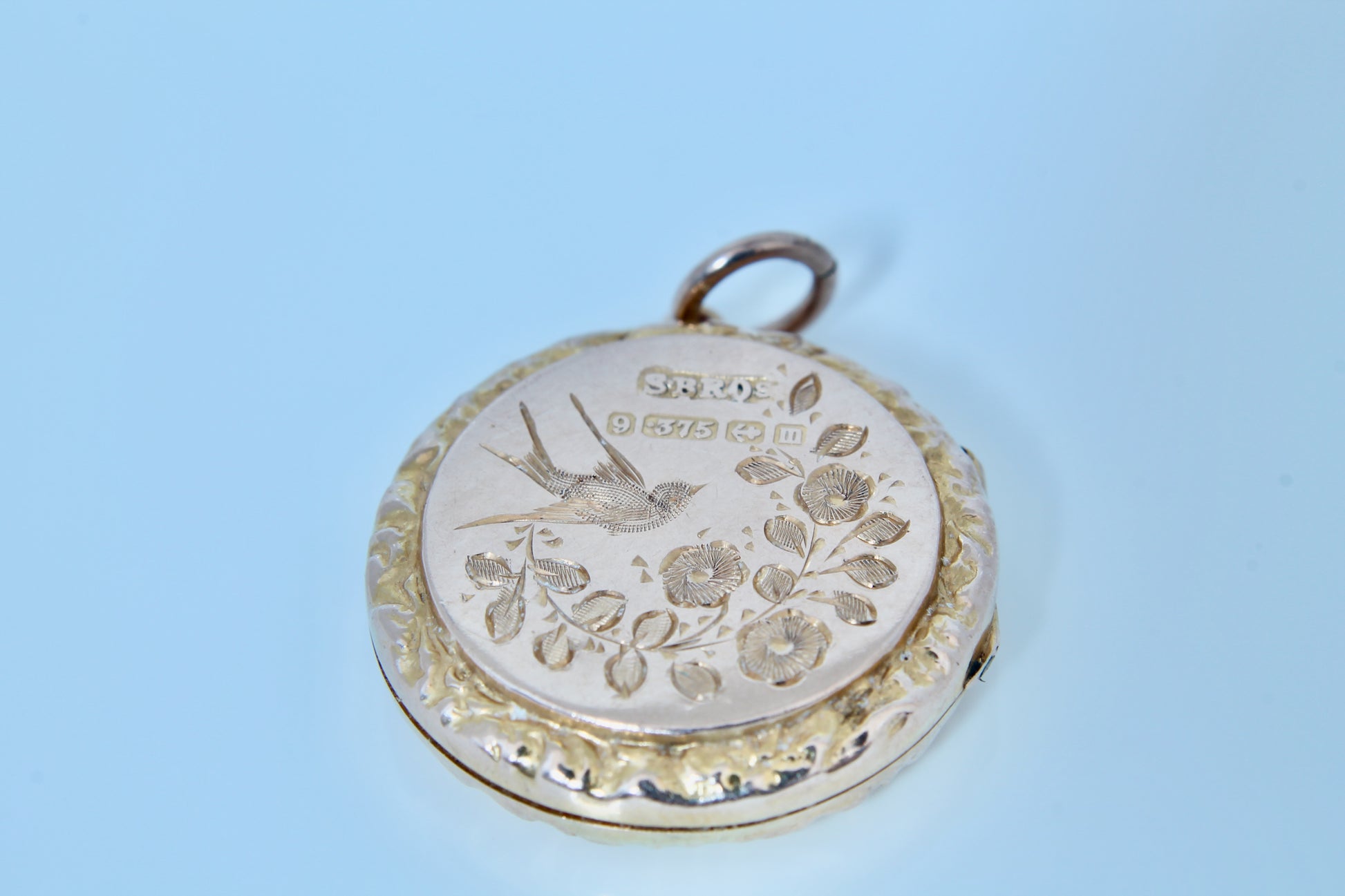 edwardian-9ct-gold-decorative-bird-locket