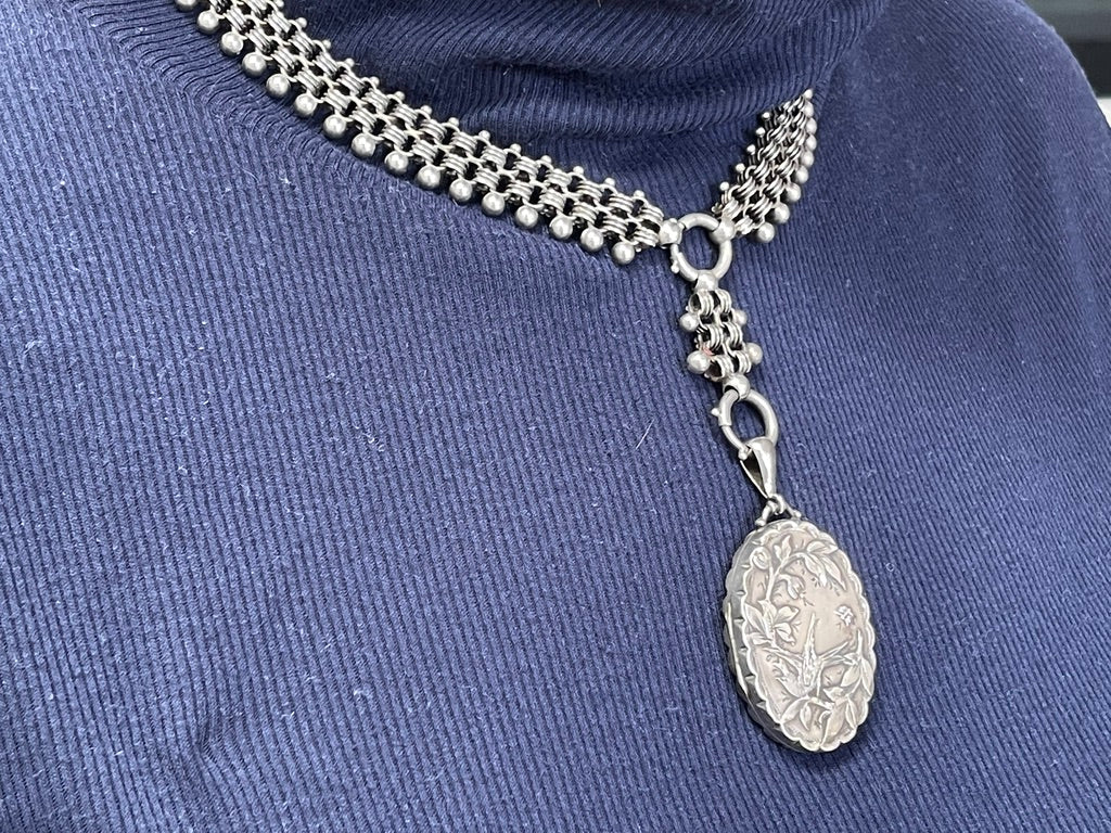 antique-victorian-silver-locket-and-ornate-collar