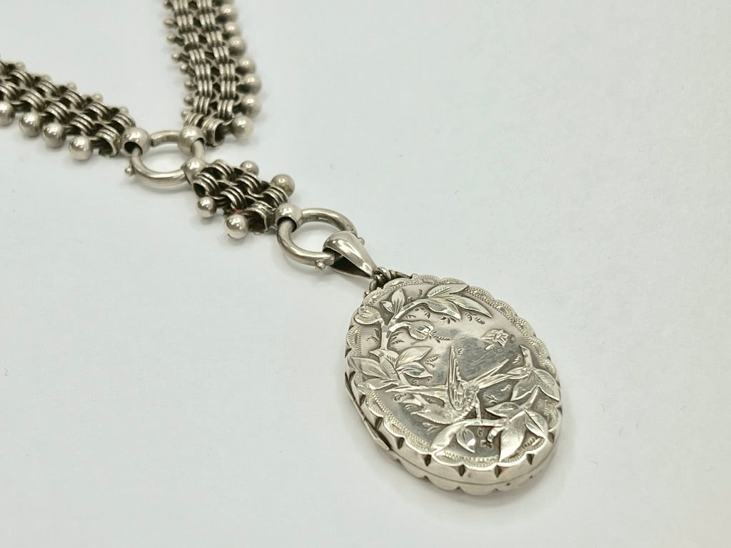 antique-victorian-silver-locket-and-ornate-collar