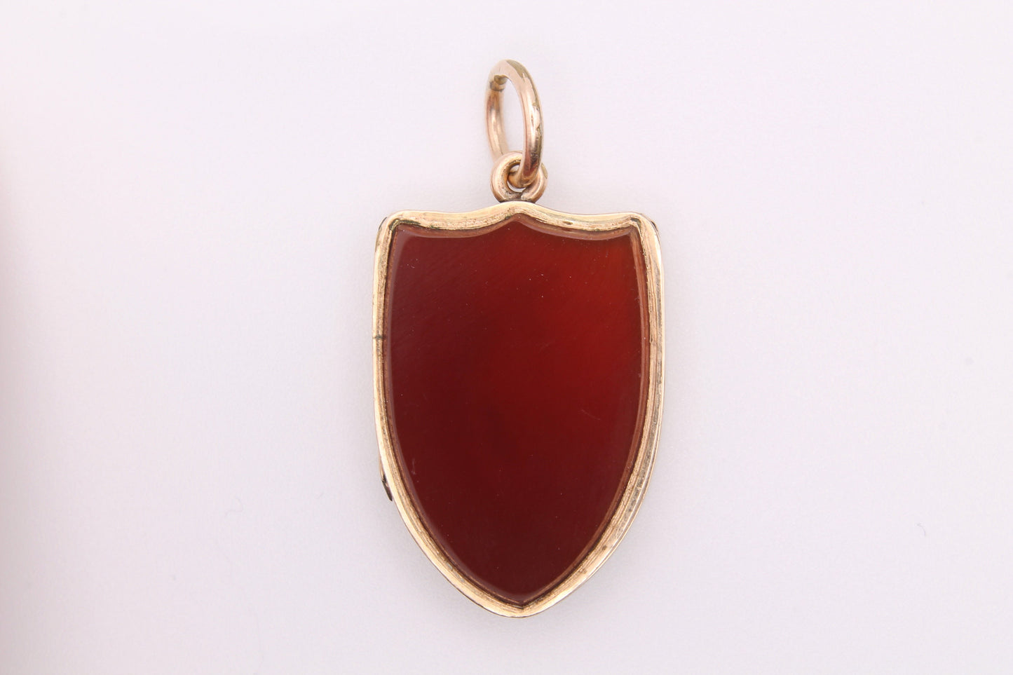 antique-victorian-9ct-gold-and-carnelian-shield-shaped-locket
